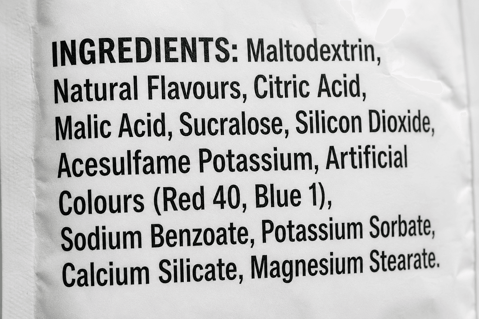 A typical sports drink ingredients list filled with chemical additives and artificial sweeteners.
